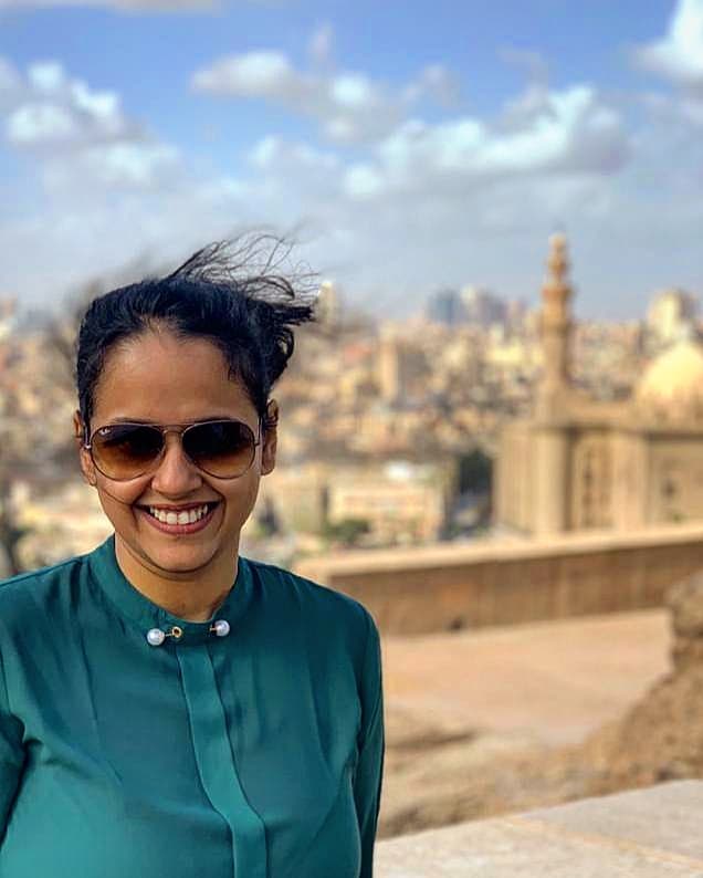 Against the panaromic backdrop of Cairo seen from the terrace at the Citadel