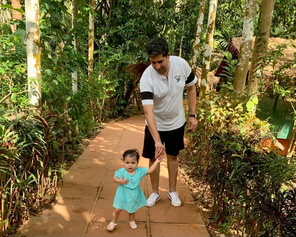 Akshay with our little one at Sahakari Spice Farms