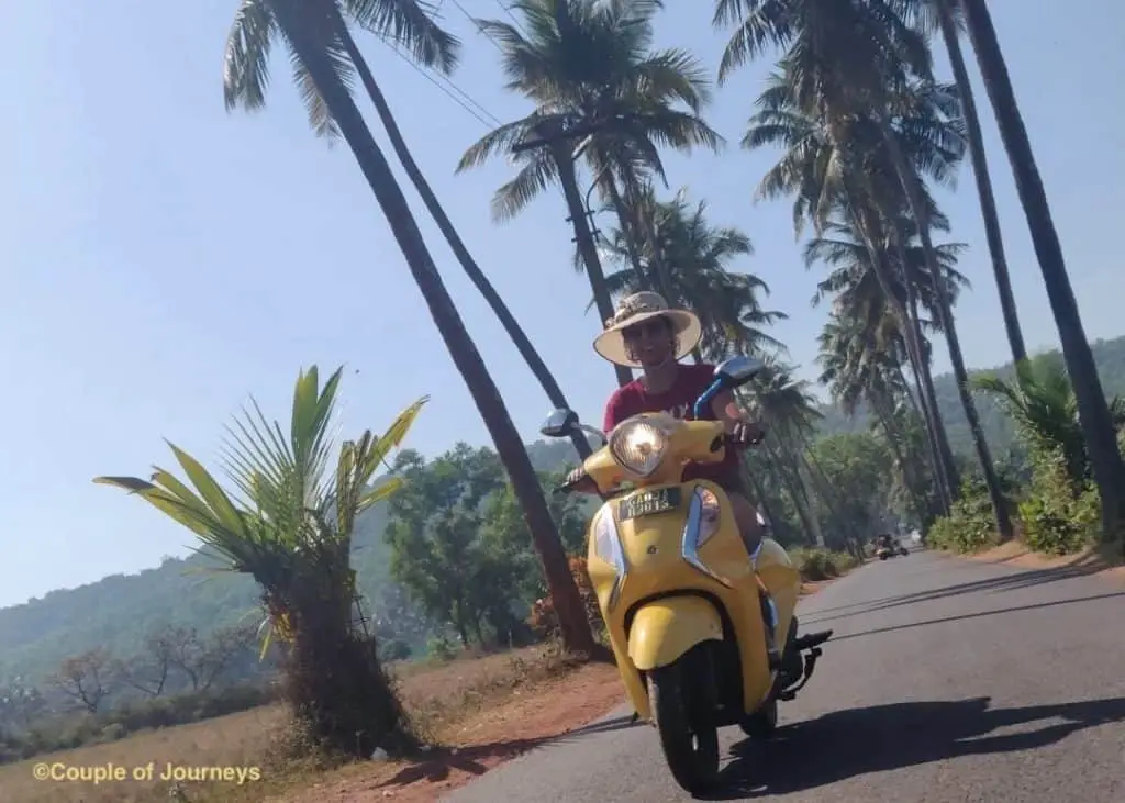 Vrushali riding a scooter in Goa