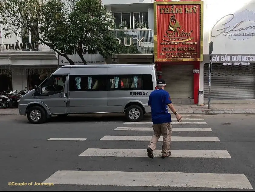 Our guide taking us to our mini-bus in Saigon