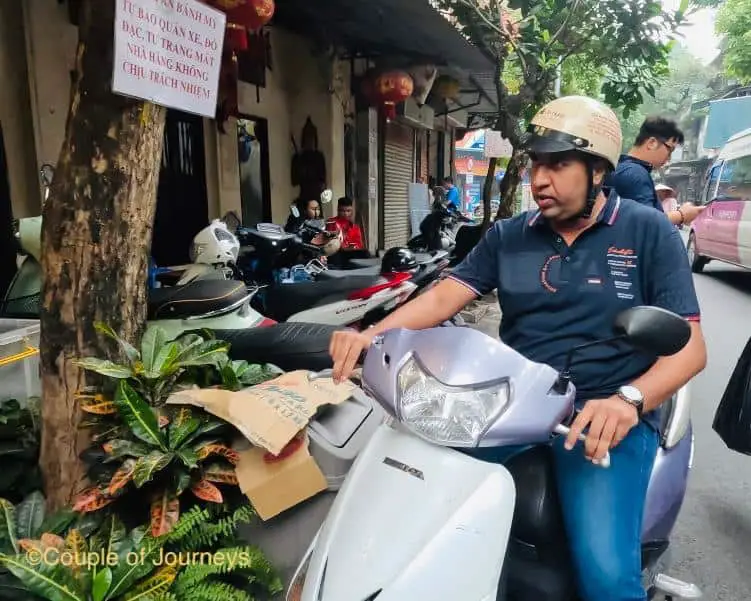 Riding a scooter in Hanoi