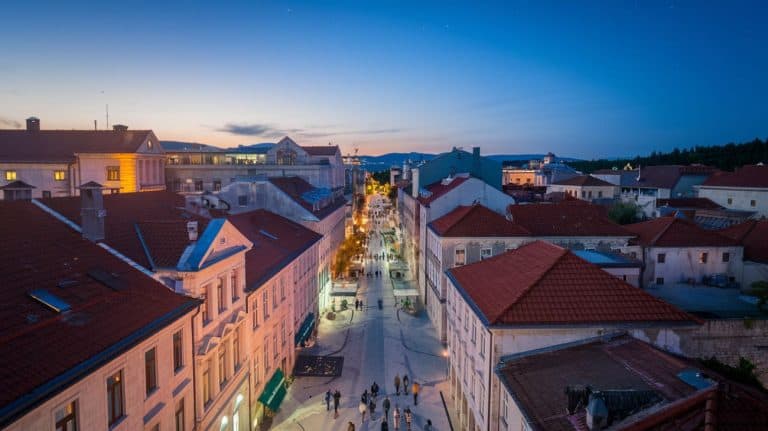 An aerial view of the bustling Old Town during the evening.