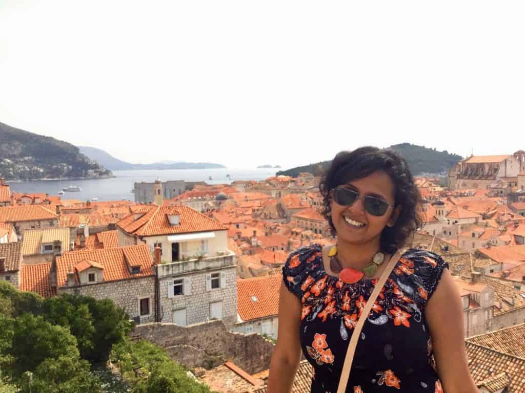 Vrushali at Dubrovnik walls in Croatia - one of the moments requriing Croatia quotes and captions for Instagram