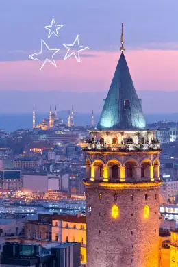 The Galata Tower illuminated during twilight, overlooking Istanbul's cityscape with the Blue Mosque visible in the distant background. Three glowing stars are drawn in the sky above the tower, adding a whimsical touch.