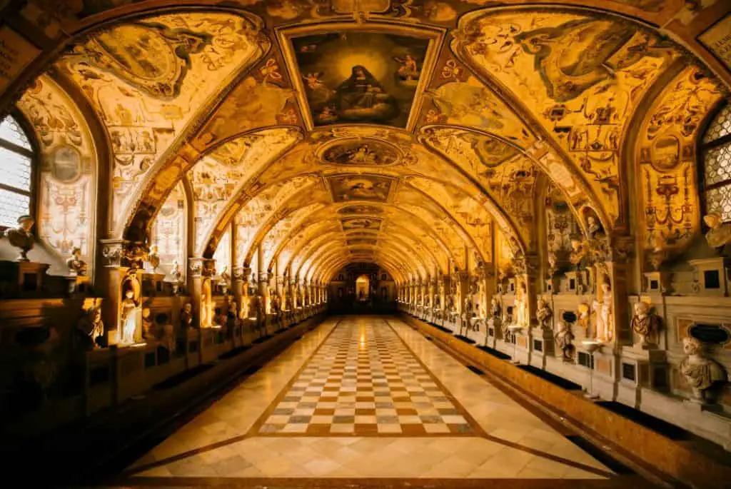 The ornately decorated Antiquarium hall inside Munich Residenz, showcasing intricate Renaissance-style artwork. A cultural highlight in any Munich Itinerary 3 Days.