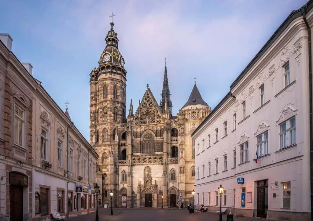  A charming old town with St. Elisabeth Cathedral at sunset, making it one of the best Cheap Travel Destinations in Europe Summer.